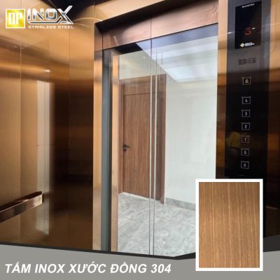 mẫu thang máy ốp inox xước đồng hairline sang trọng